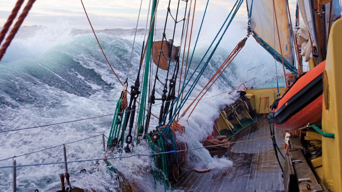 Professional Yacht Delivery Services 3 Traditional tall ship under sail during offshore passage