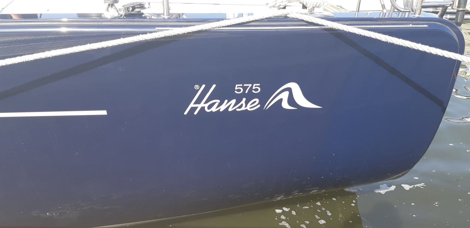 Hanse 575 logo on the hull of S/Y Baltico Hanse 575 logo on the hull of S/Y Baltico