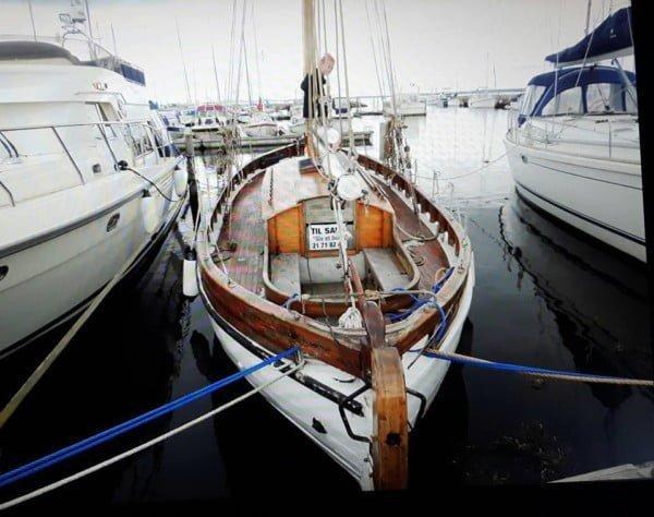 Tilikum, wooden pilot cutter, alongside before the delivery
