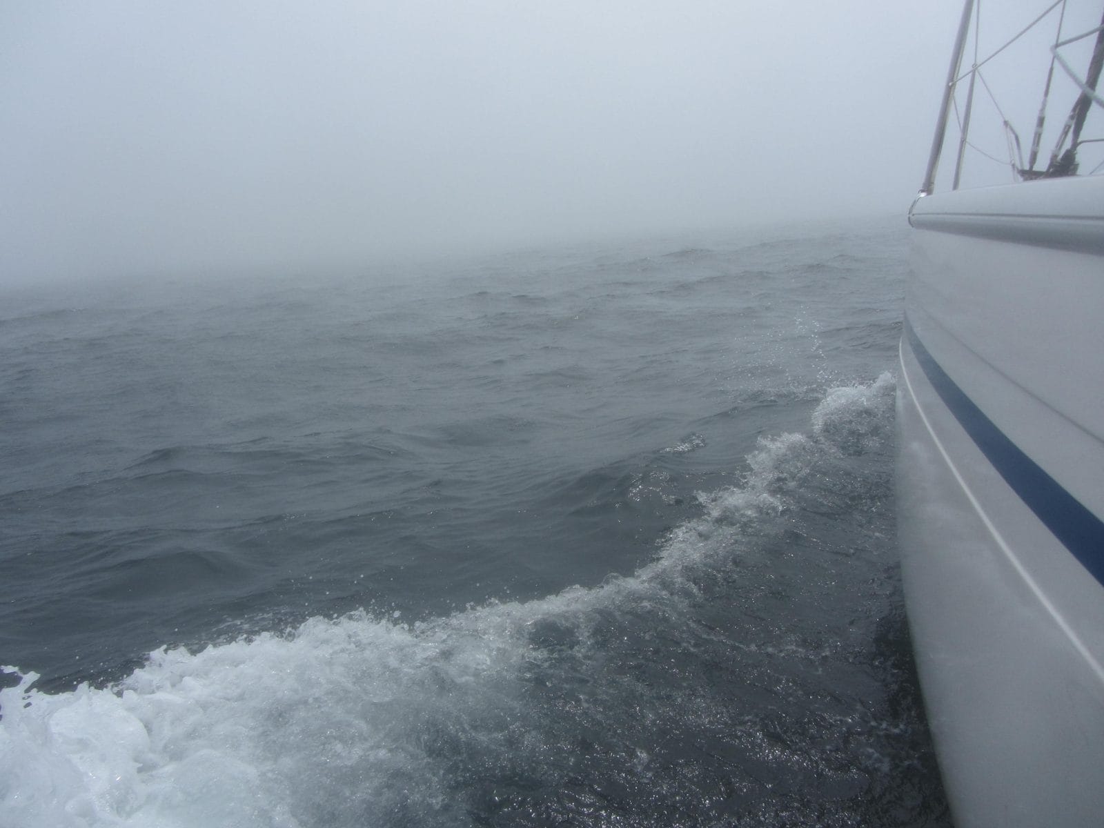 Bavaria 31 sailing in thick fog off the coast of Portugal during the delivery to Palma