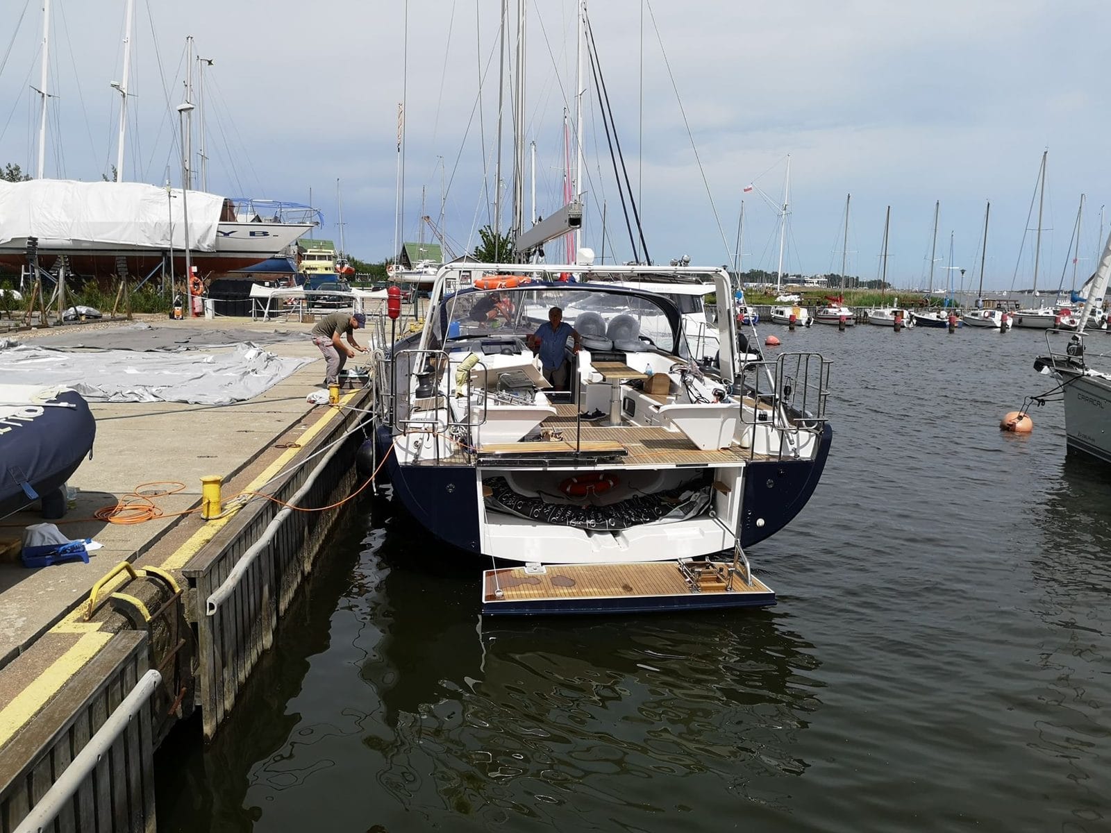 Hanse 575 Baltico moored stern-to in the marina before the yacht delivery to Sardinia Hanse 575 Baltico moored stern-to in the marina before the yacht delivery to Sardinia