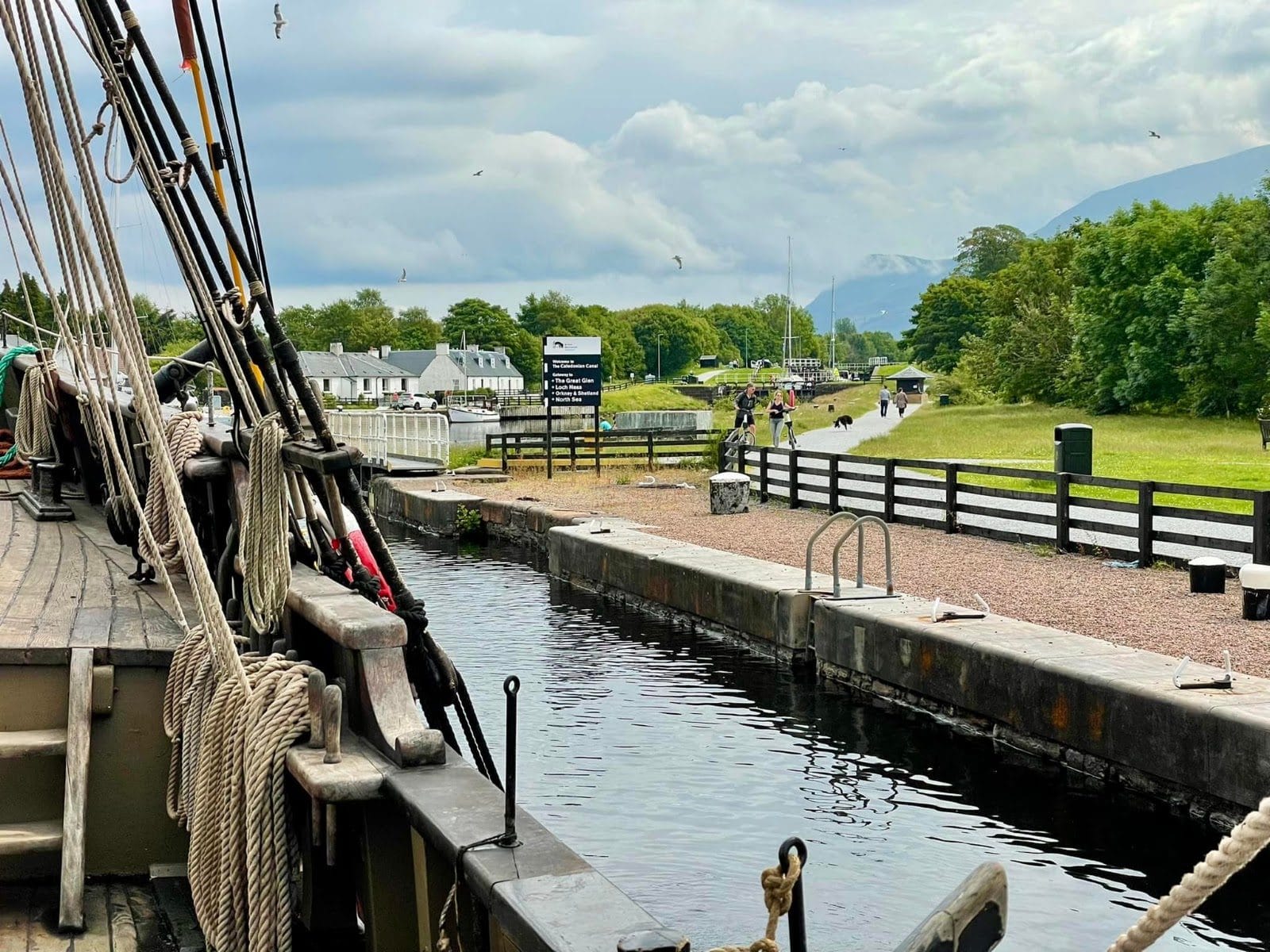 View from the deck of tall ship Phoenix entering a lock of the Caledonian Canal